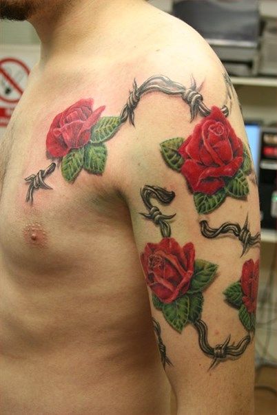 Roses With Barbwire Tattoo By Mirek Vel Stotker Bike Tattoos