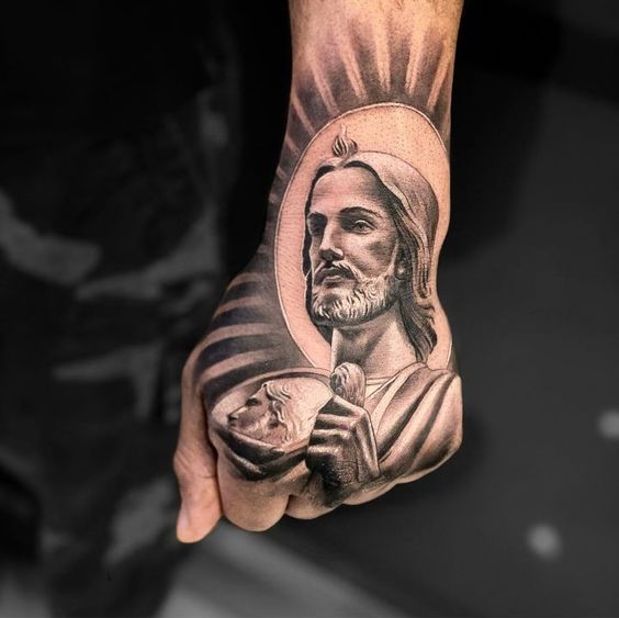 5 Meanings Behind San Judas Tattoo On Hand