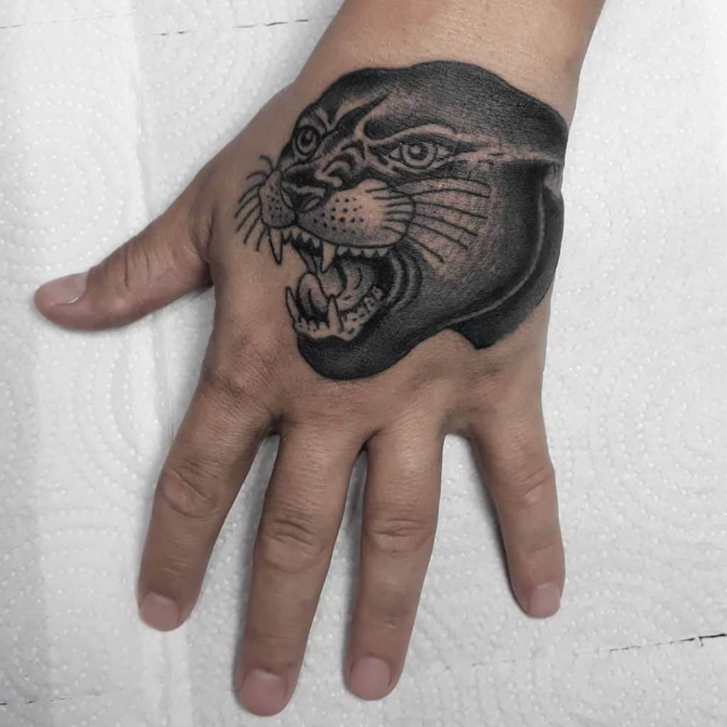 Share 71 Panther Hand Tattoo Latest In Cdgdbentre