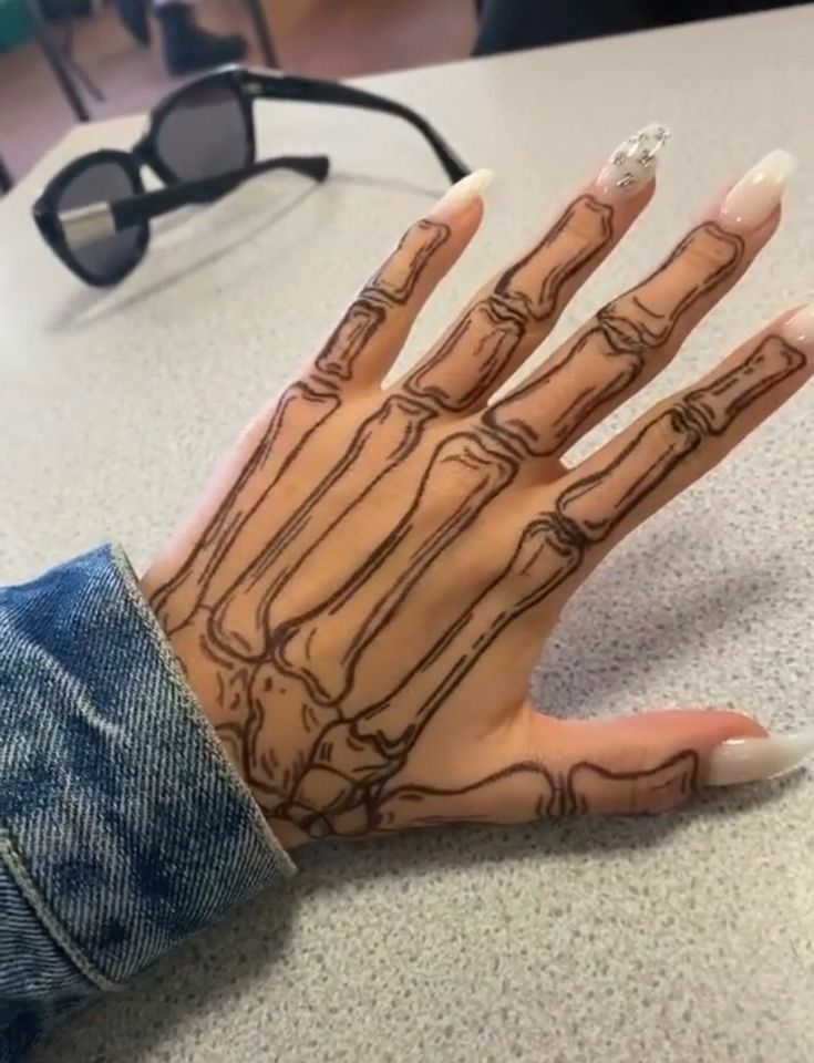 Skeleton Hand Tattoo Ideas: Simple and Striking Designs