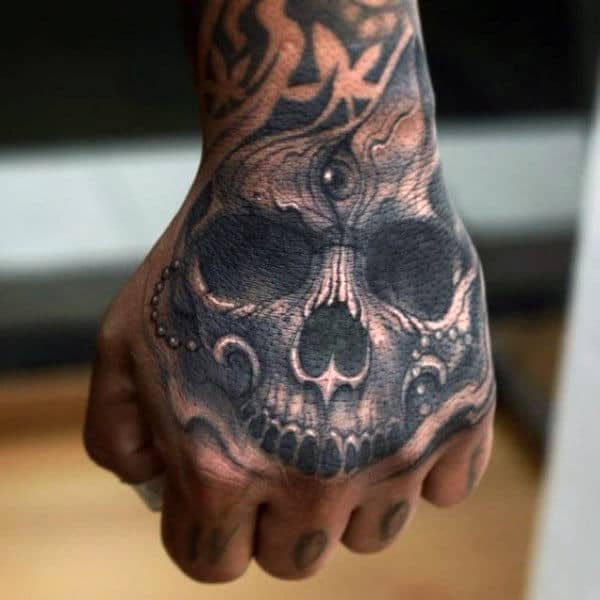 5 Bold Skull Hand Tattoo Ideas for Men