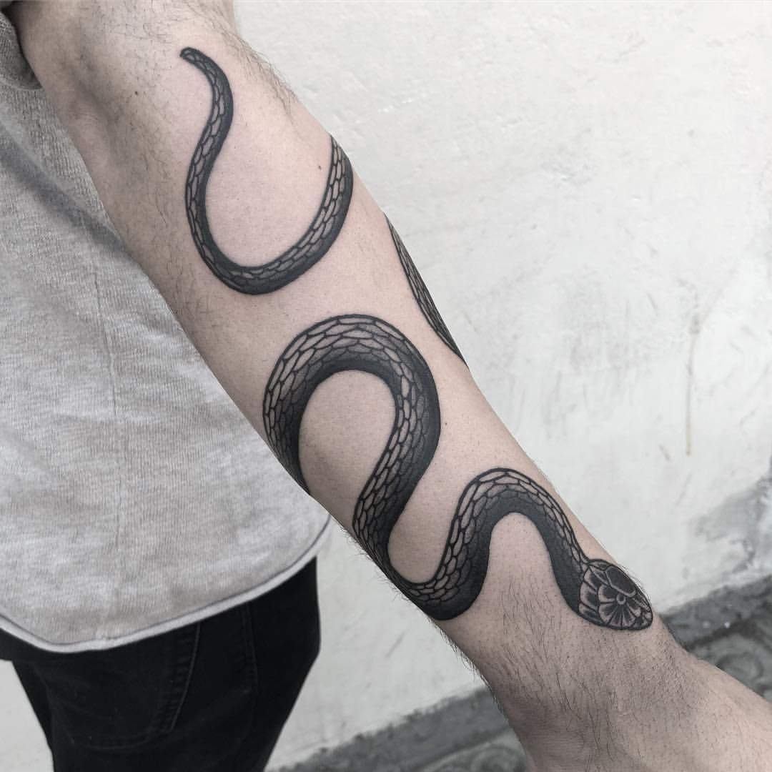 5 Stunning Snake Tattoo Designs for Your Arm