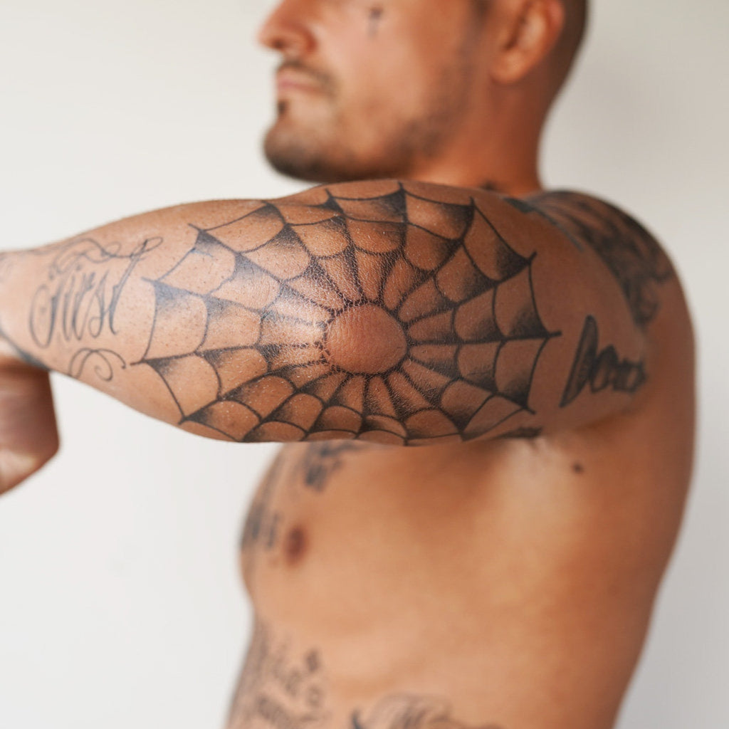 Spider Web On The Elbow Tattoo