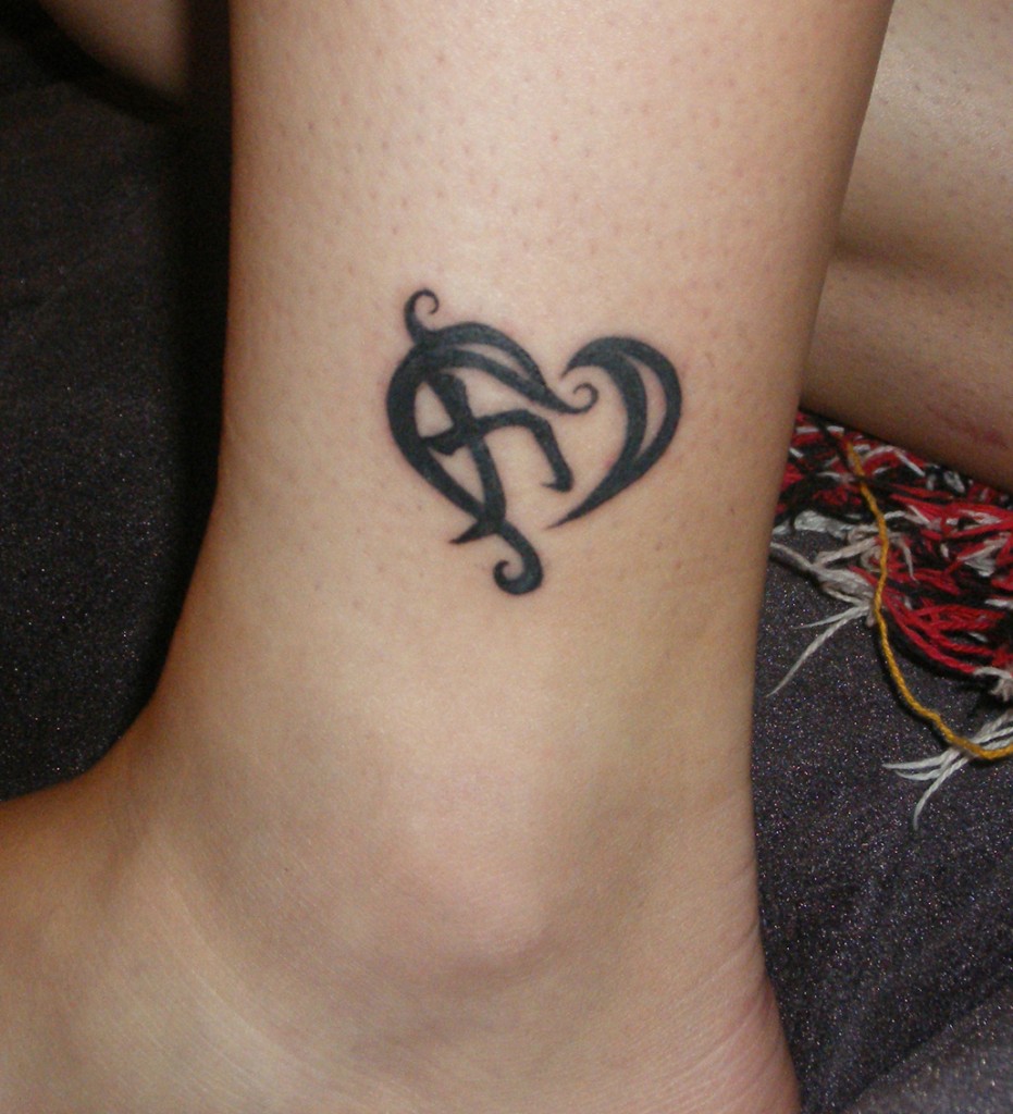 Strength Symbol Tattoo