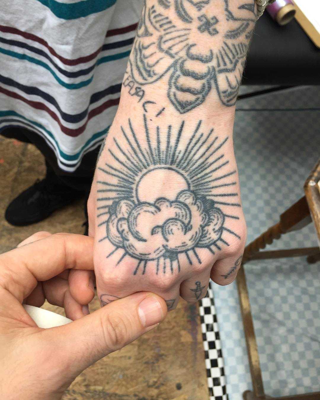 Sun And Clouds Tattoo By Kirk Budden Tattoogrid Net