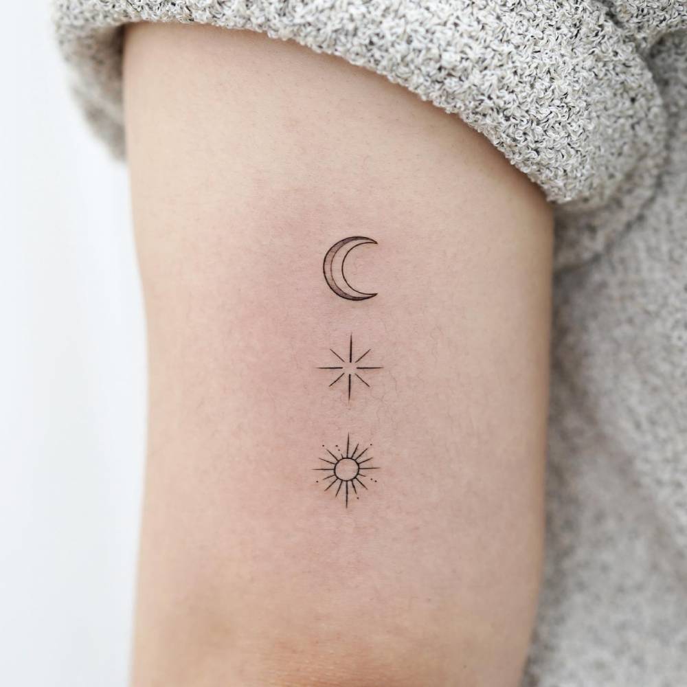 Sun Moon And Star Tattoo Located On The Tricep