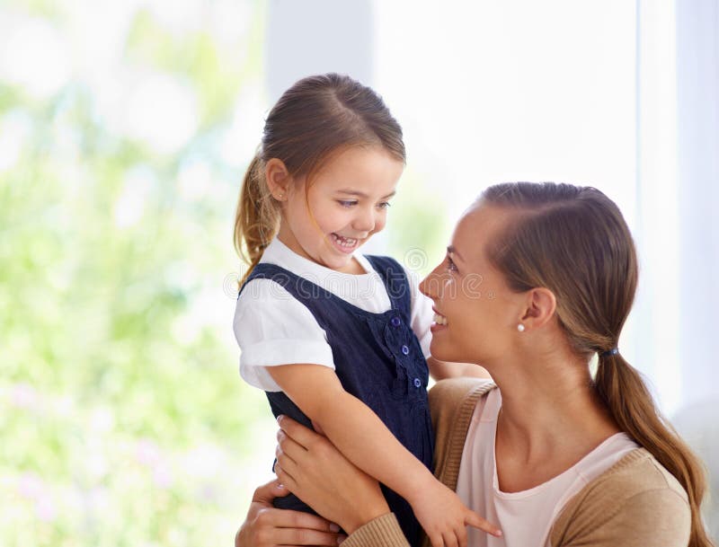 Sweet Moments A Young Mother And Her Little Girl Bonding At Home