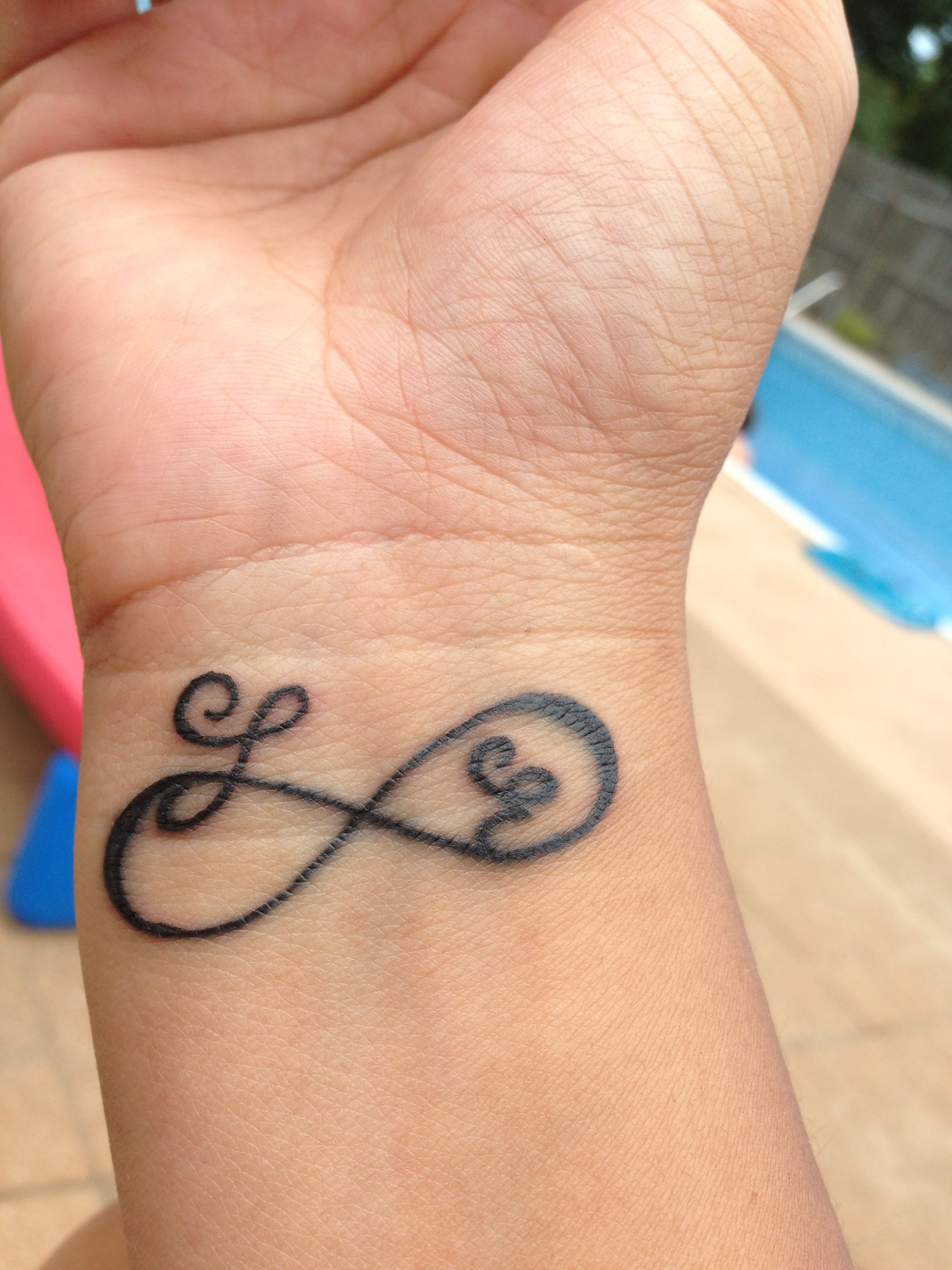 Tattoo Of Infinity Initials Letters