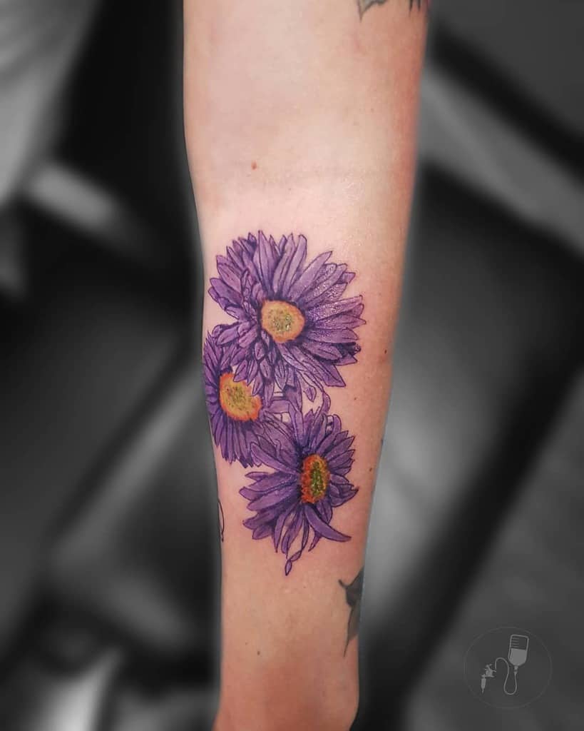 Aster Flower Tattoos: Meaningful Ink for Enthusiasts