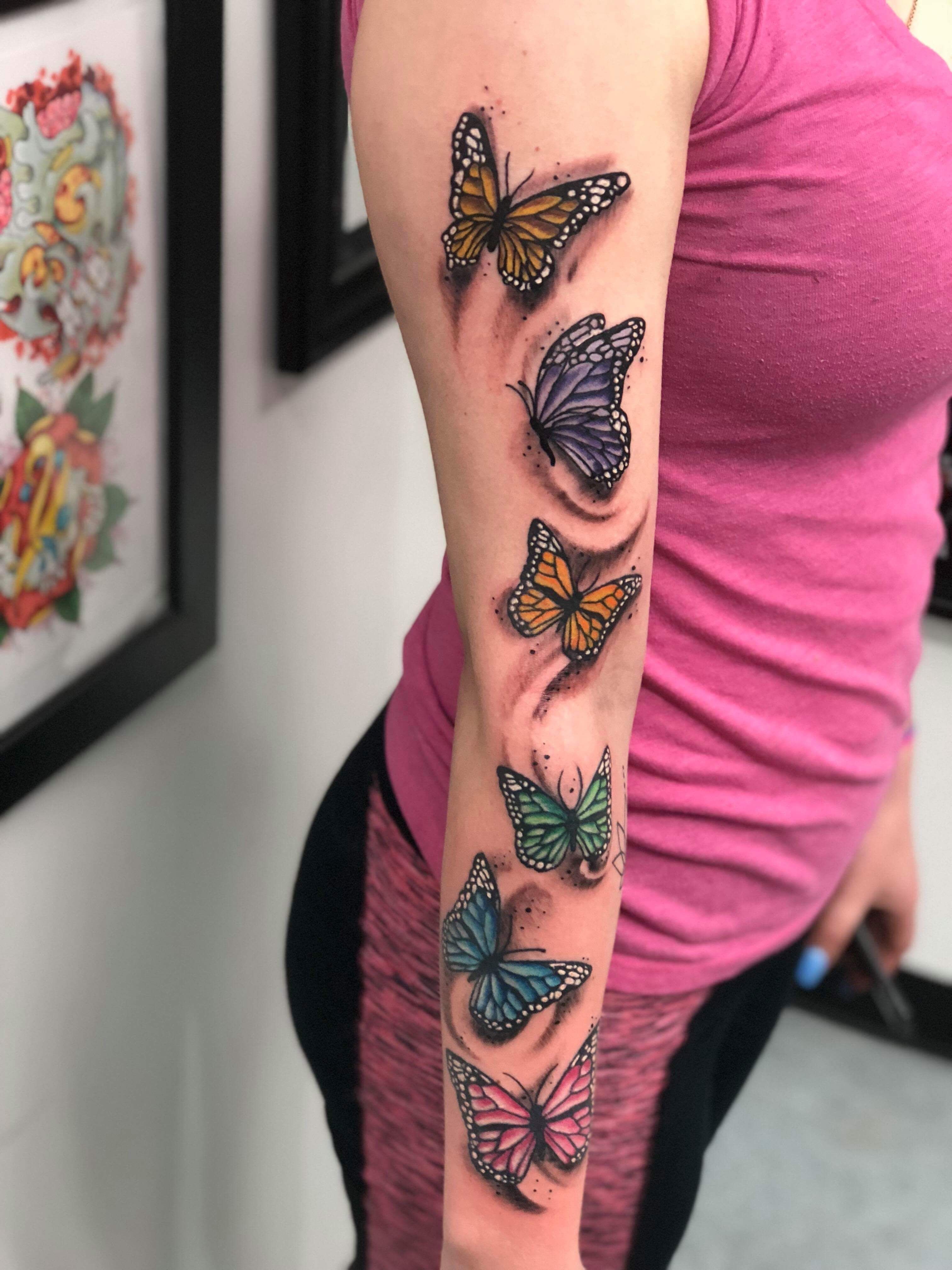 5 Stunning Butterfly Tattoo Designs for Your Arm