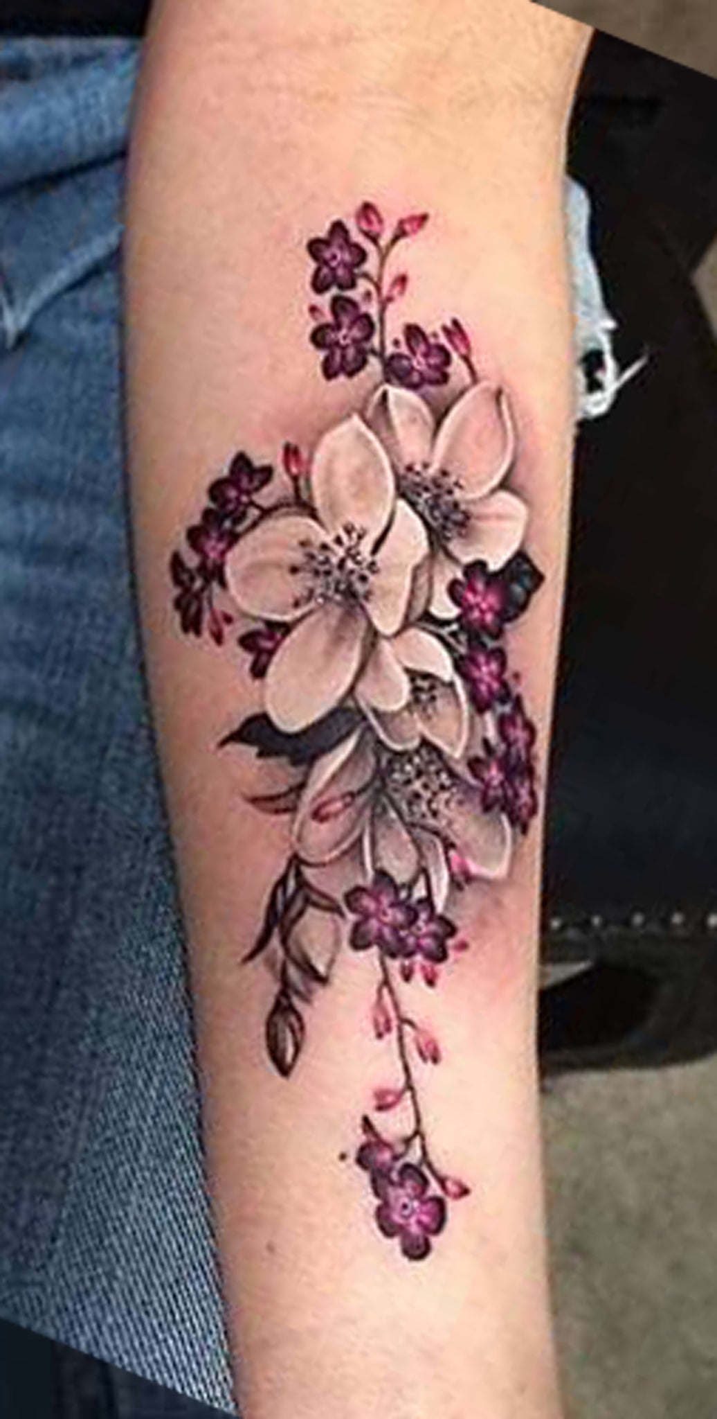 Tattoos On The Arms And Legs Of Women With Flowers Leaves And Swirls