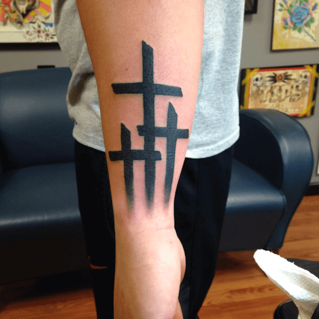 The Meaning And Design Of 3 Cross Tattoo