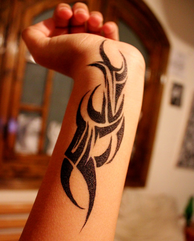 10 Stunning Tribal Wrist Tattoo Designs for Inspiration