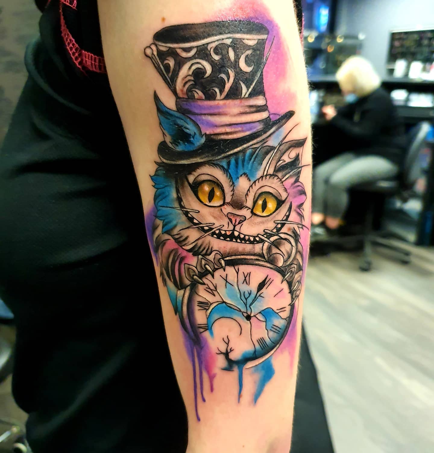 Whimsical Tattoo Of The Mad Hatter Character From Alice In Wonderland