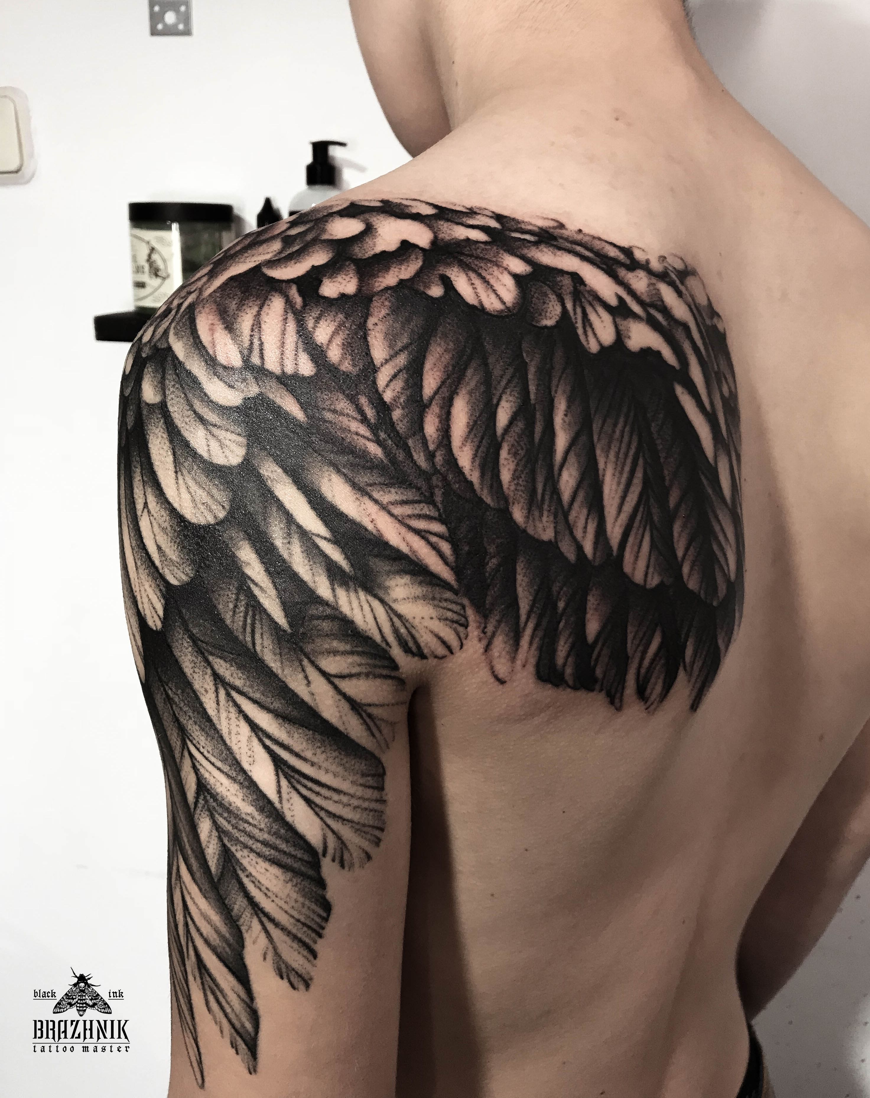 Discover the Symbolism of Wing Tattoos on Your Back