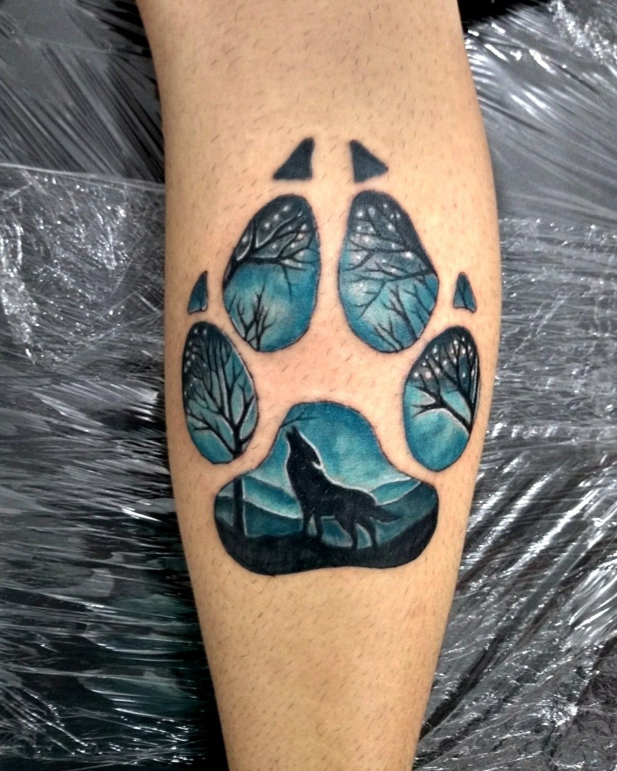 5 Creative Wolf Paw Print Tattoo Ideas