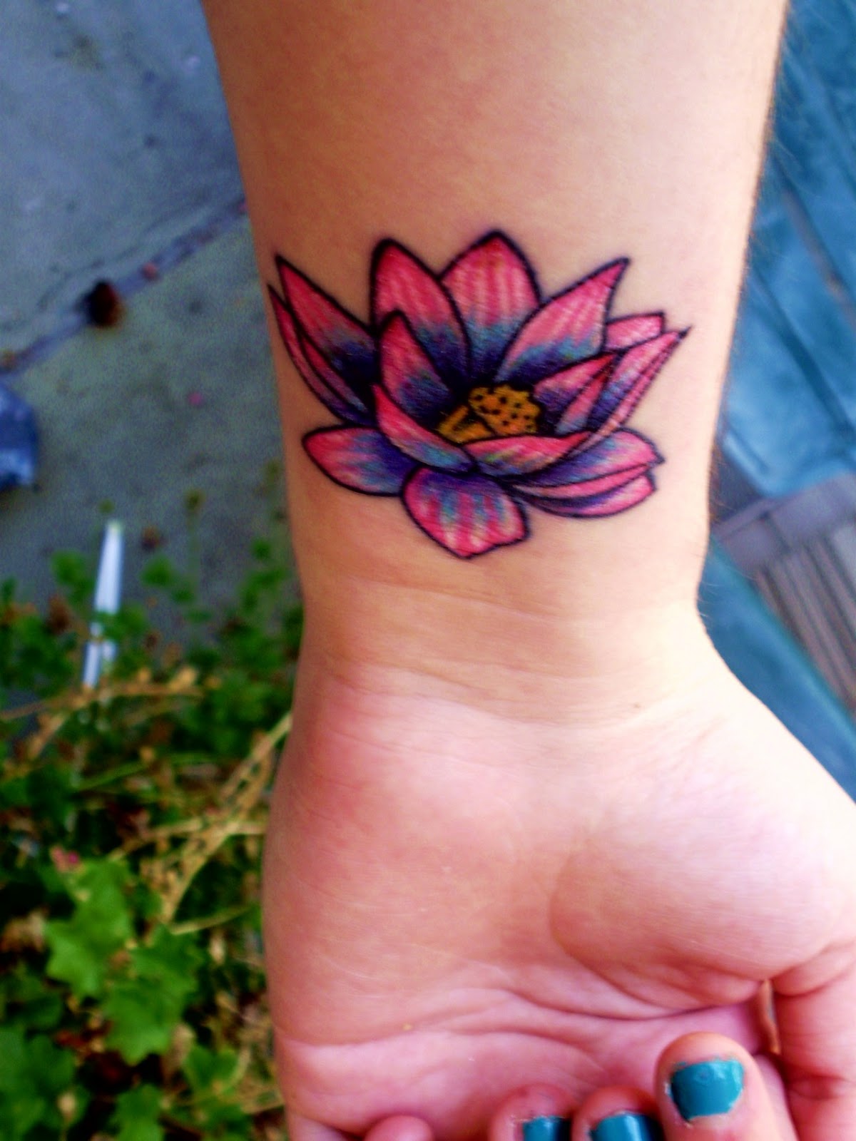 Wrist Lotus Flower Tattoo: Meaning and Designs