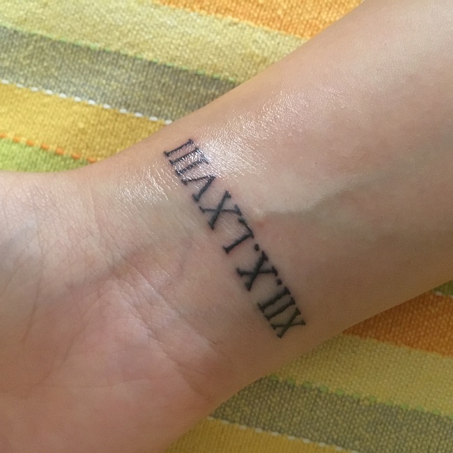 Wrist Tattoo Ideas: Elegant Roman Numeral Designs